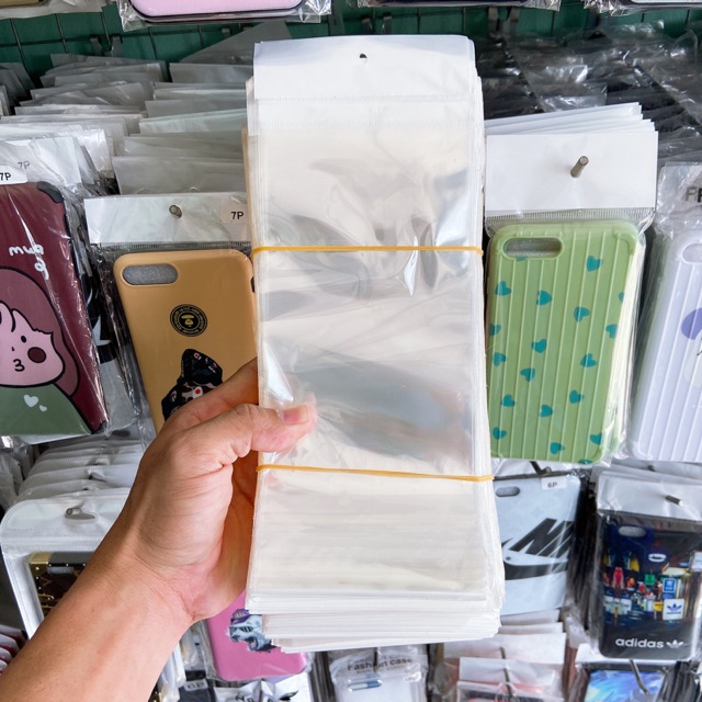 Túi đựng ốp lưng điện thoại dán miệng có màng ngọc treo/ Túi đựng ốp lưng điện thoại dán keo có lỗ treo ( 1kg)