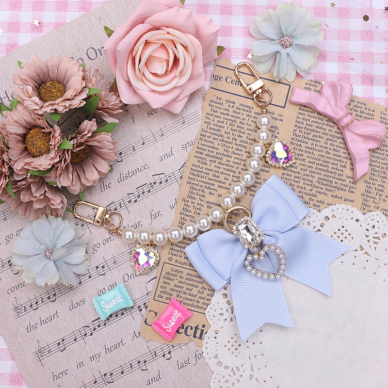 MÓC KHÓA, DÂY TREO TÚI XÁCH NƠ ĐÍNH ĐÁ CAO CẤP 2255