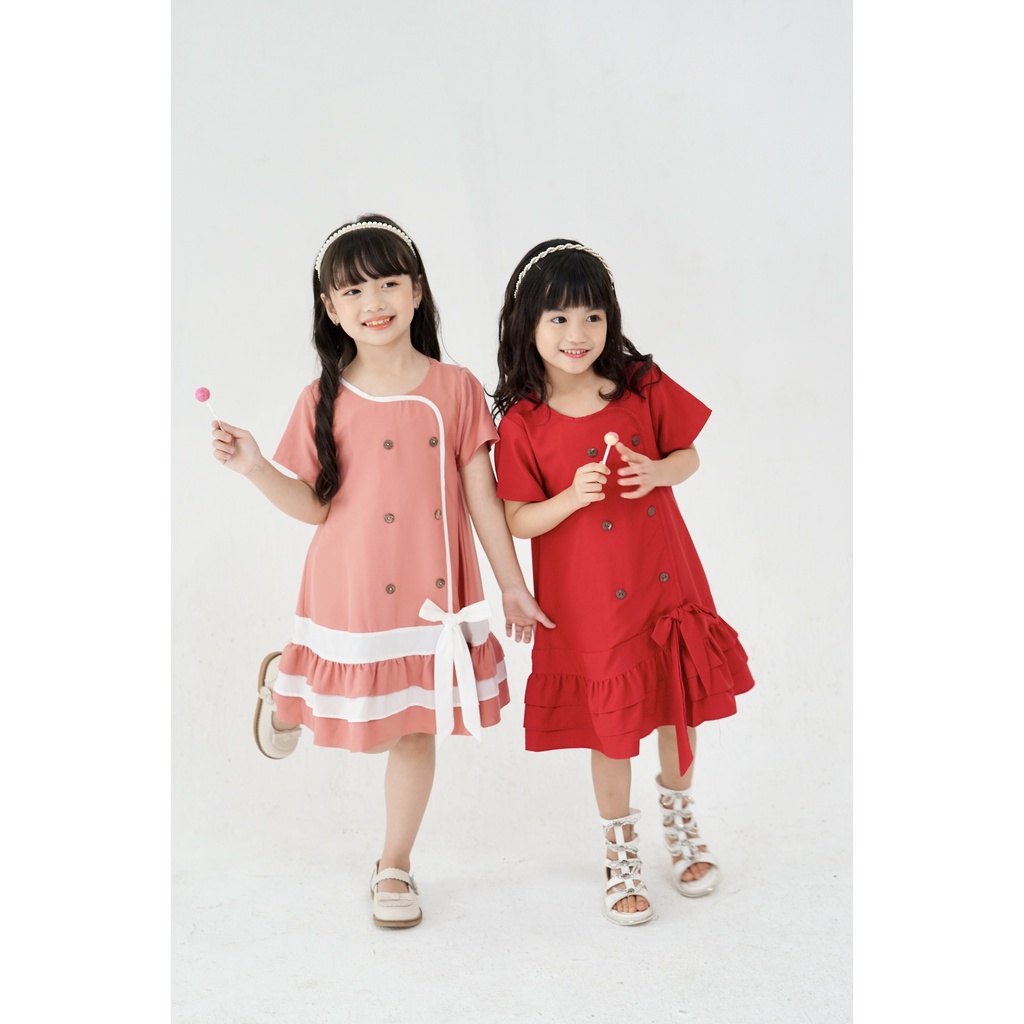 Váy bé gái dáng suông hồng thắt nơ cao cấp Sunkid SM size trẻ em 4-12 tuổi