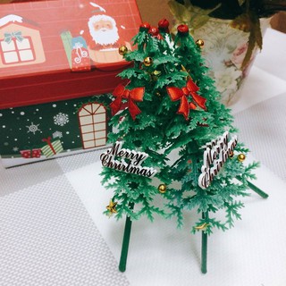 cây thông nhựa lớn trang trí bánh kem