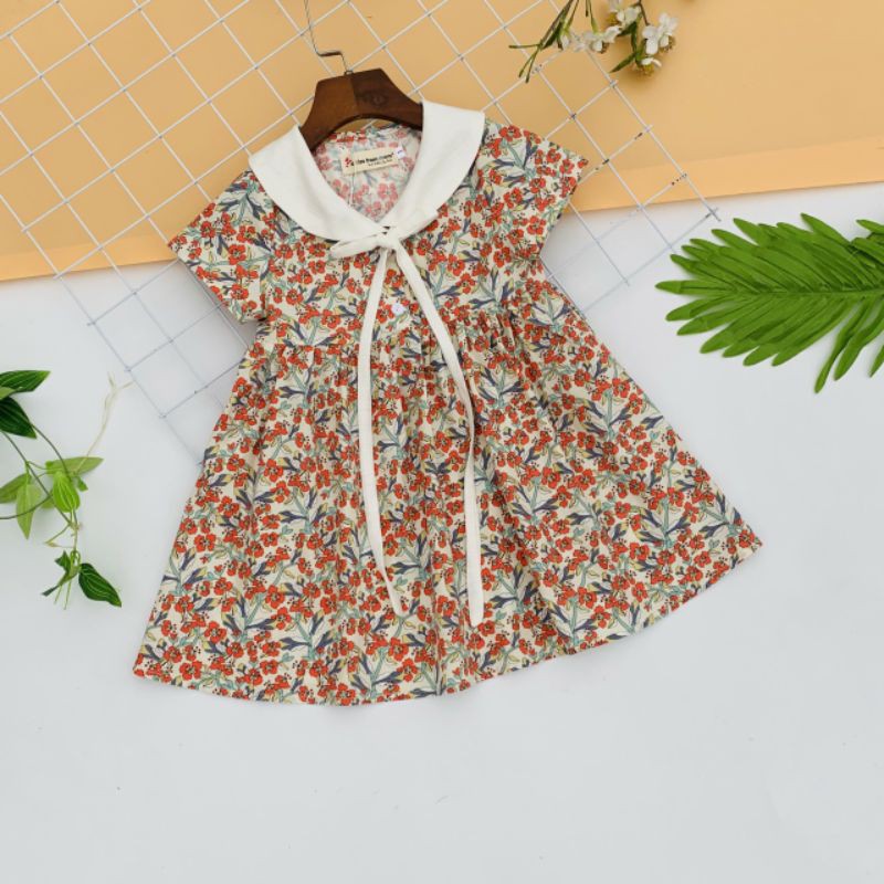 Đầm hoa nhí cổ sen trắng