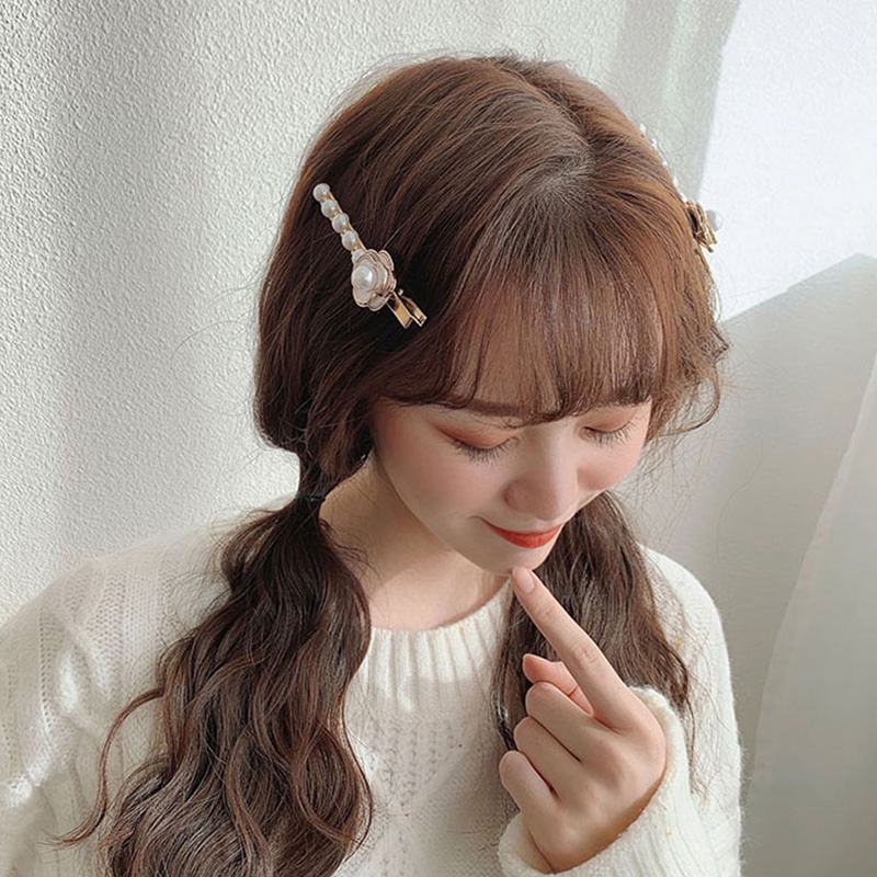 Kẹp tóc một bên đính ngọc trai nhân tạo thời trang 2021