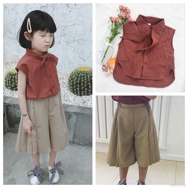 Quần dài + áo thun không tay có gắn nơ dành cho bé gái