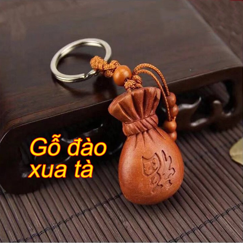 Móc khóa túi phúc gỗ đào đuổi tà khí xua tan tai họa