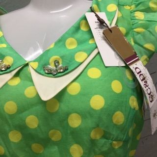 Đầm xanh lá chấm bi vàng size S