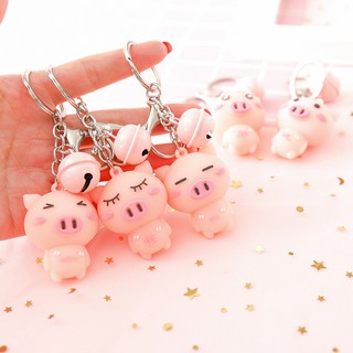 Móc khóa kèm heo hồng kèm chuông nhỏ giá sỉ