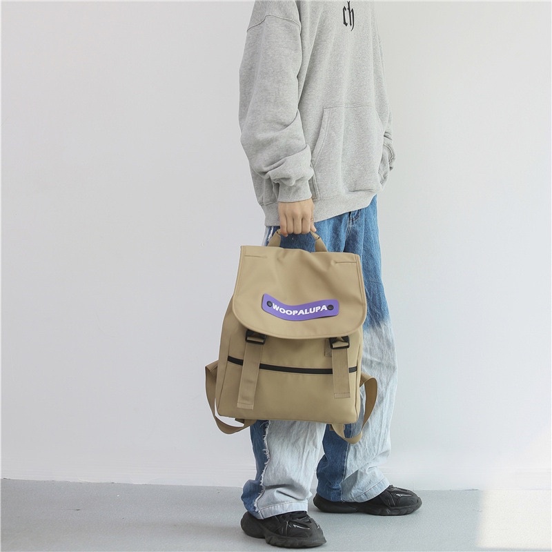 Balo Woo Unisex Quai Cài Khuy Hai Bên Chống Nước Dày Dặn, Balo Đi Học Nam Nữ Tag Da Cá Tính