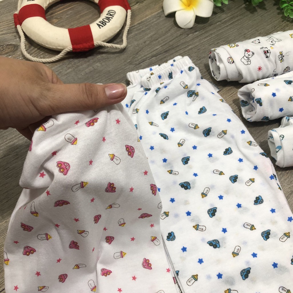 Quần dài cho bé sơ sinh in hình bình sữa chất liệu Cotton