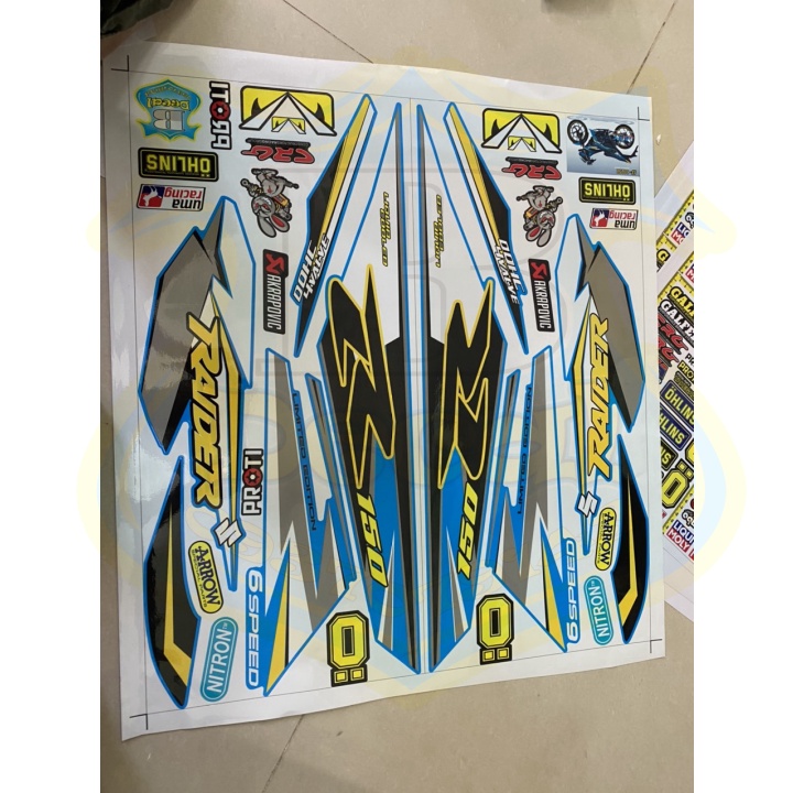 ( Quí khách vui lòng mang ra tiệm cho thợ dán ) Tem Raider Fi xanh ngọc