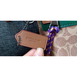 Túi Coach Clutch