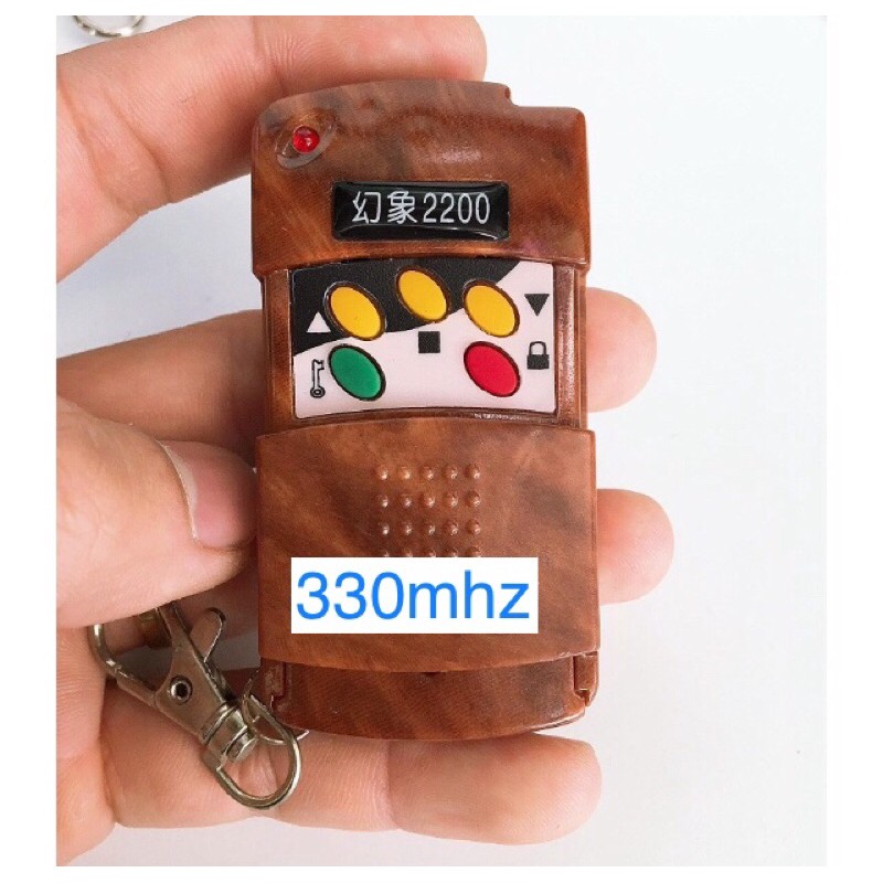 Remote điều khiển cửa cuốn 2200 mã gạt 8 số , tần số 330mhz