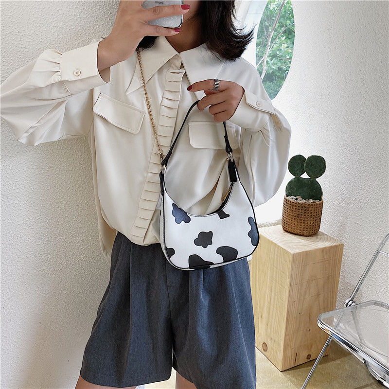 Túi xách đeo vai họa tiết da bò sữa thiết kế thời trang cho nữ | BigBuy360 - bigbuy360.vn