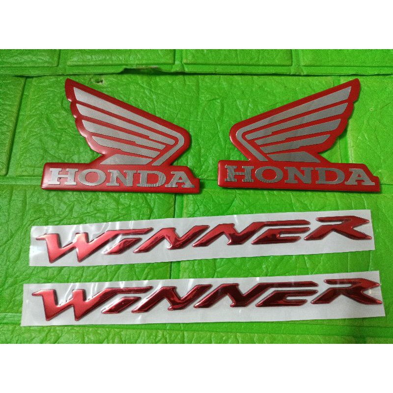 Bộ tem nổi Winner đỏ cánh chim hợp kim nhôm