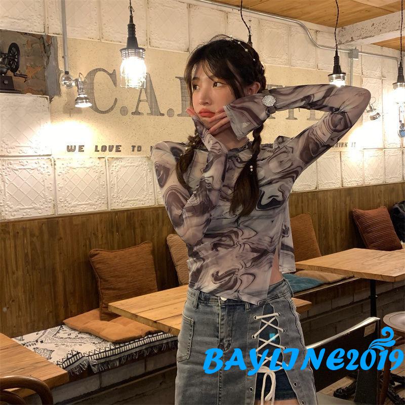 Áo dài tay thiết kế xẻ tà in họa tiết độc đáo thời trang cho nữ