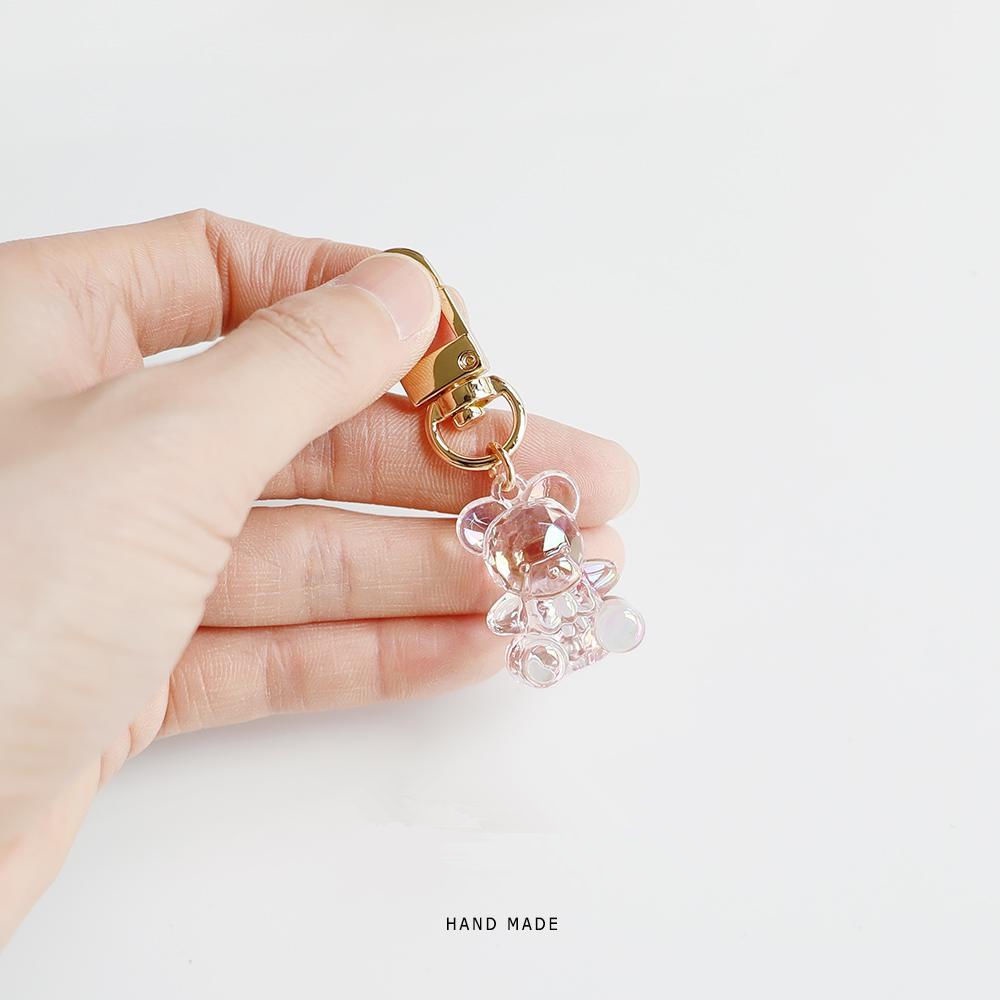 Móc Khóa Gắn Vỏ Bảo Vệ Hộp Sạc Tai Nghe Airpods Trong Suốt Hình Gấu Dễ Thương