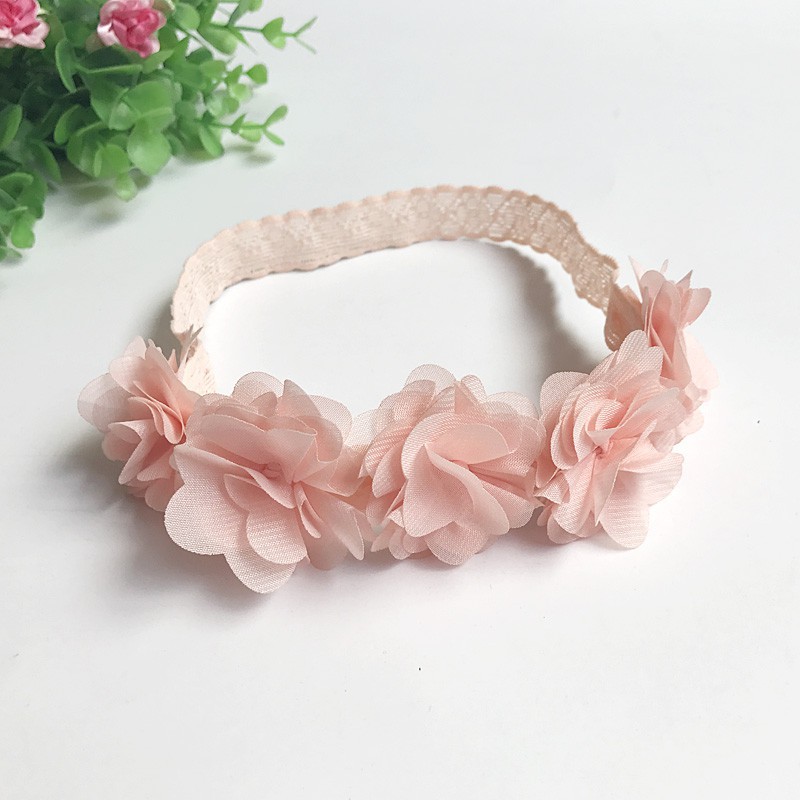 Băng đô gài tóc hoa xinh xắn dễ chịu cho bé gái