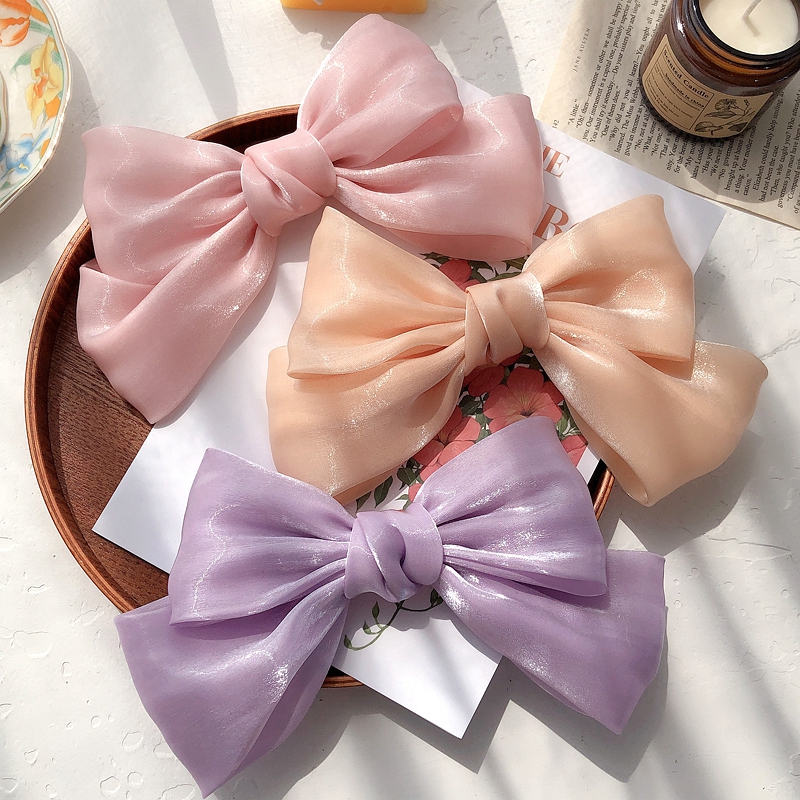 Kẹp tóc kiểu nơ thời trang dành cho nữ