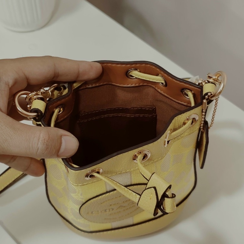 Túi Coach bucket rút miệng mini - nhiều màu sale xả