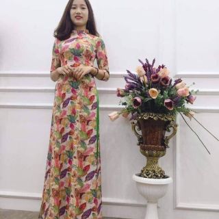 Áo dài lá vàng quần xanh