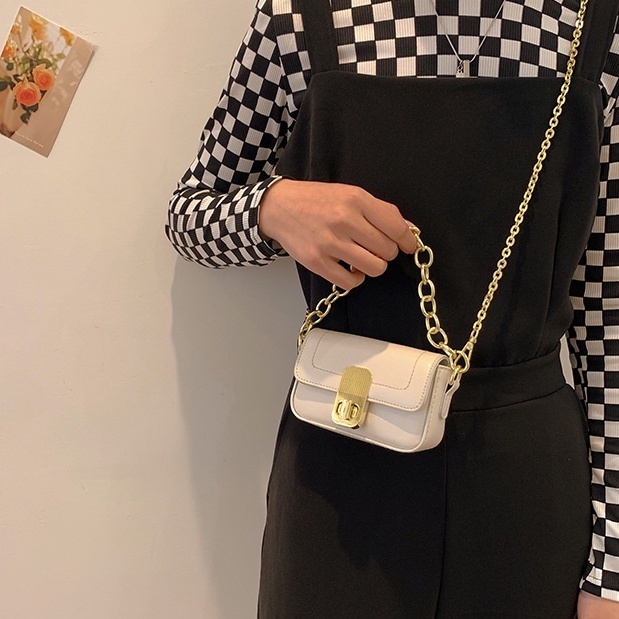 Túi xách nữ mini đeo chéo đẹp có quai xích khóa xoay dọc da mềm phong cách hiện đại CV5