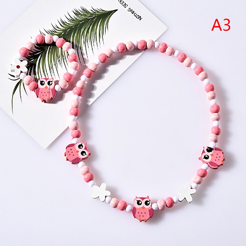 1 Bộ Vòng Cổ Chuỗi Hạt Gỗ Hình Hoạt Hình Dễ Thương Cho Bé Gái