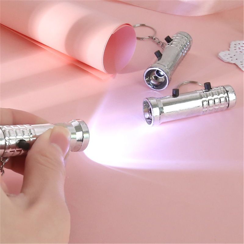 Móc Khóa Có Đèn Pin Tia UV Phát Hiện Đồ Chơi Cho Trẻ Em