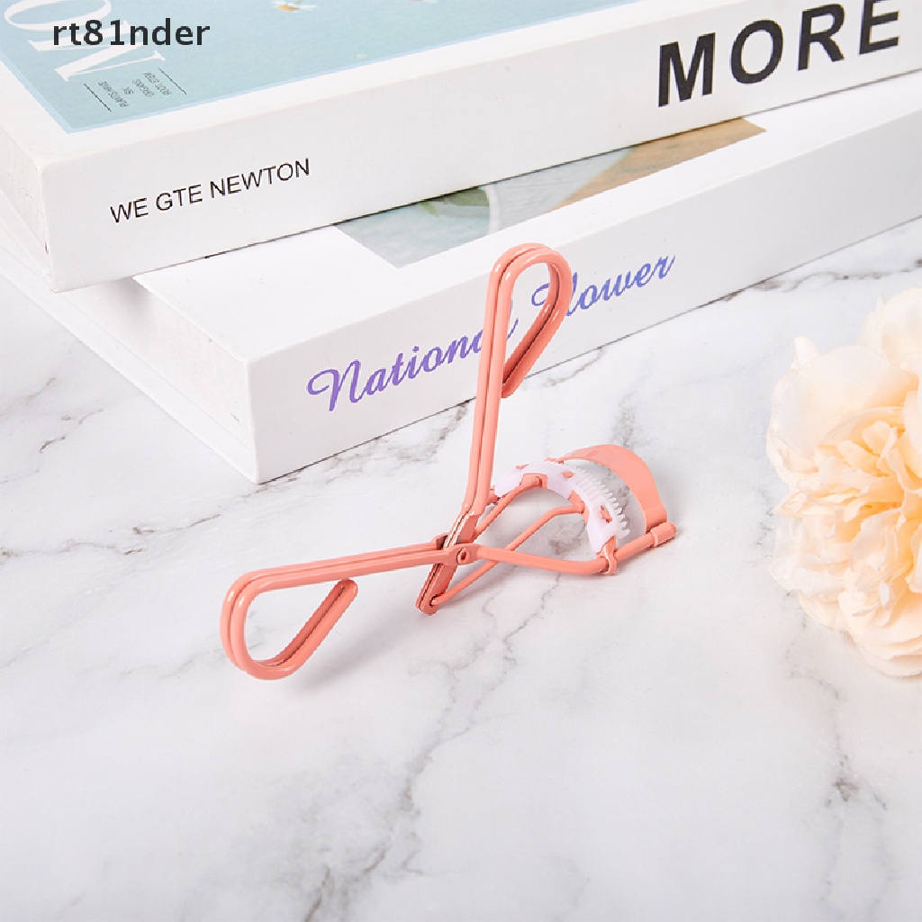 1 Dụng Cụ Bấm Mi Tích Hợp Lược Tiện Dụng