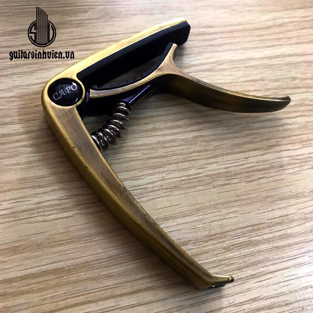 Capo guitar nguyên khối, có móc nhổ chốt gym - Capo 2 tác dụng cho guitar - tặng 1 pick khi đặt hàng