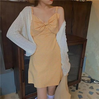Váy 2 dây caro vàng nơ ngực