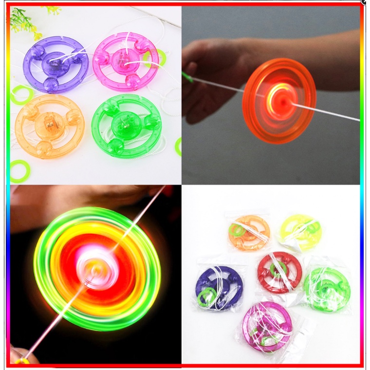 Đồ Chơi Con Quay Đĩa Bay Bằng Nhựa Xoay Có Đèn Led Vui Nhộn Cho Bé