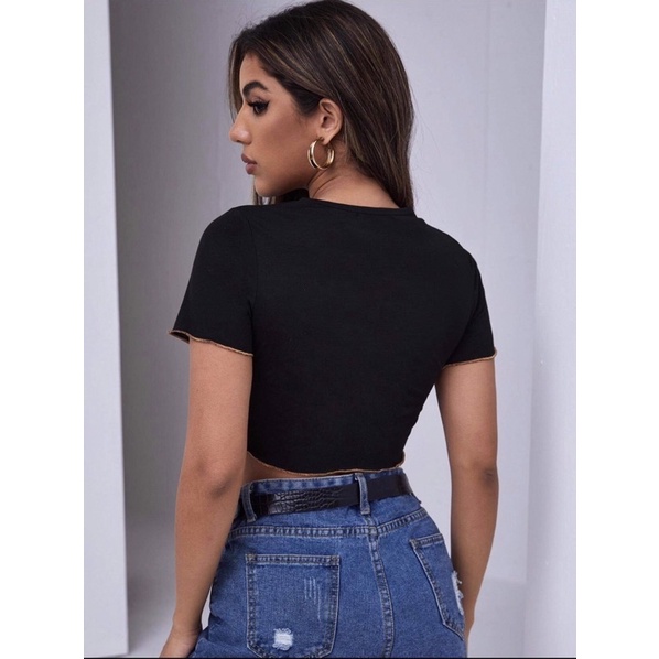 Áo croptop ôm xoăn lai phối chỉ cam in DALLAS, 2 màu