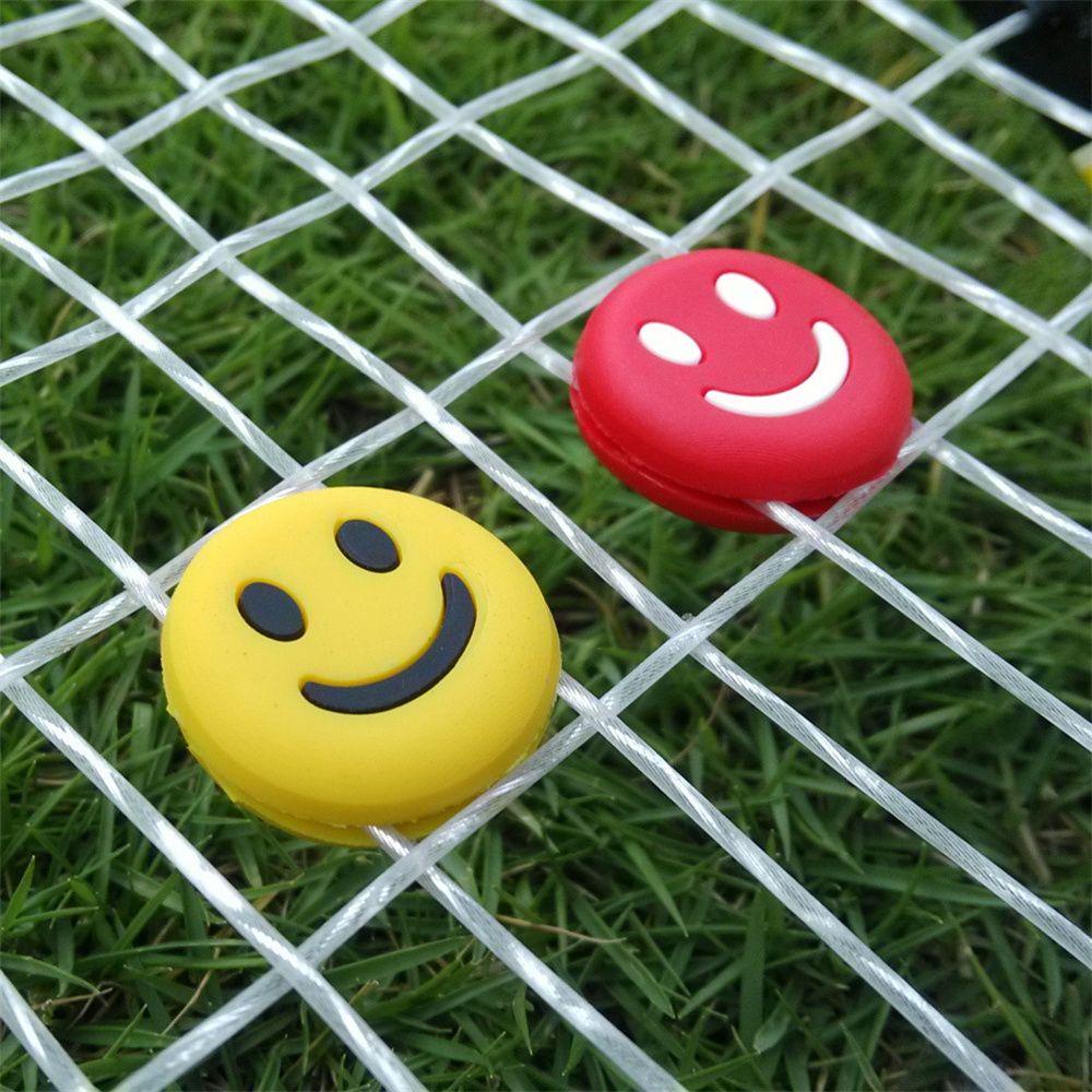 Dụng Cụ Giảm Xóc Gắn Mặt Cười Cho Vợt Tennis