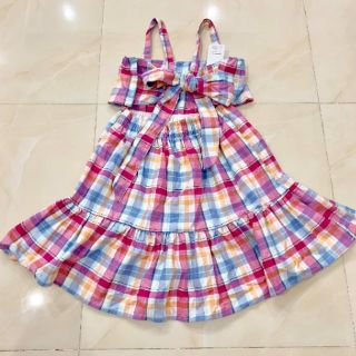 Đầm caro buộc nơ sau new tab