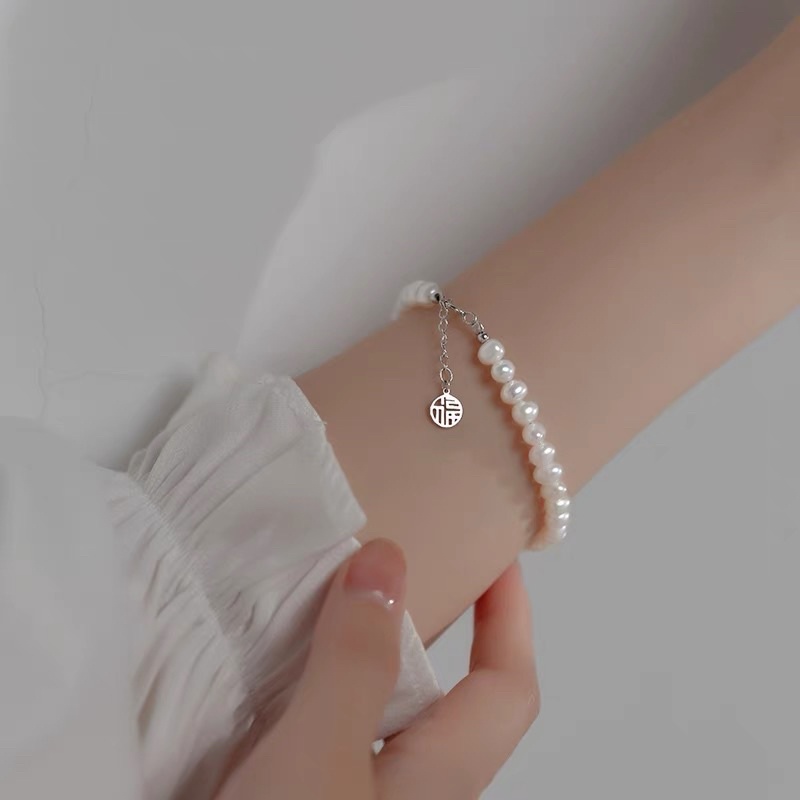 Vòng tay ngọc trai nhân tạo đồng xu may mắn