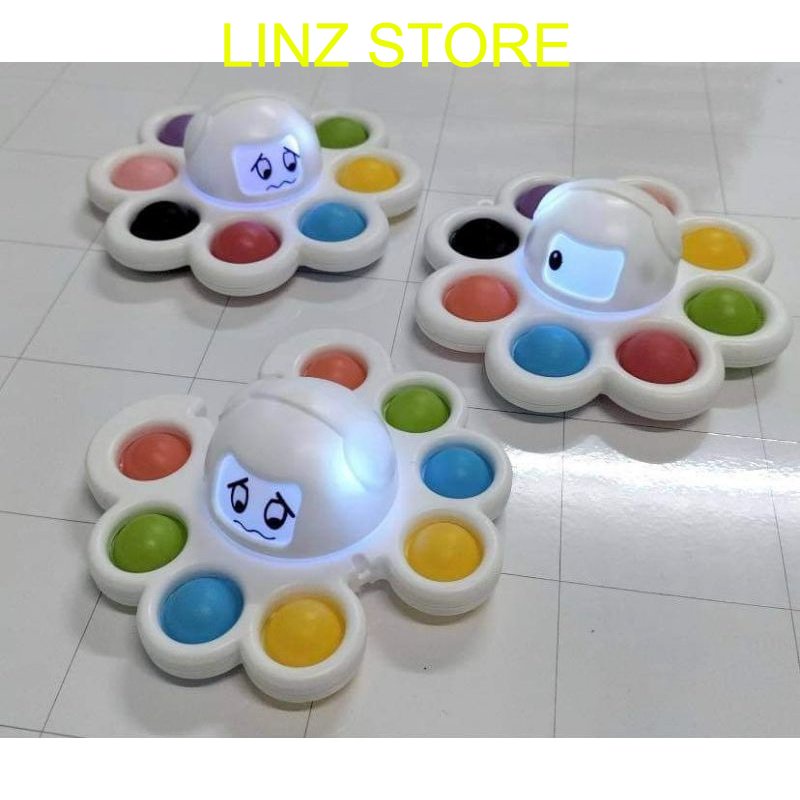 Popit bạch tuột quay phát sáng, 3 sắc thái, kèm dây đeo. Linzstore89