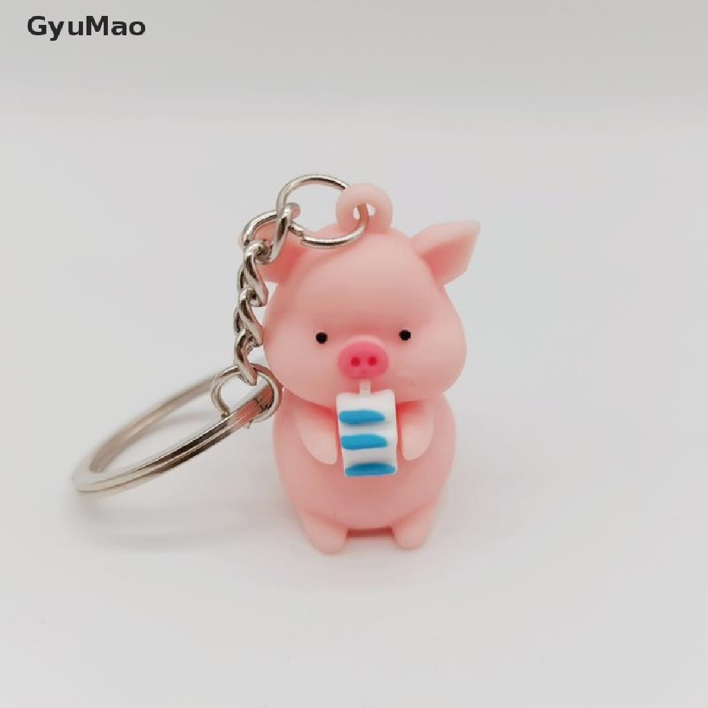 Móc khóa gắn hình chú heo con mặc áo mưa dễ thương