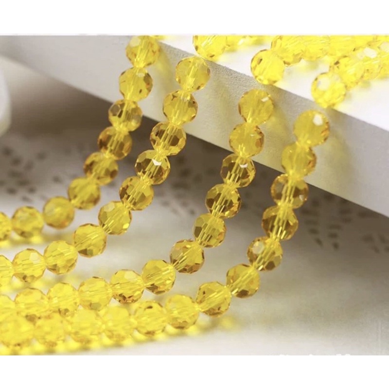Hạt pha lê tròn góc cạnh 6mm dùng sâu vòng trang sức ( gói 100 viên )