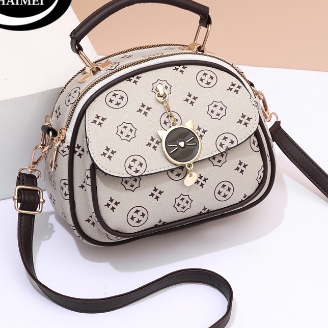 Túi xách nữ thời trang khóa phụ kiện mèo xinh xắn đeo chéo 252