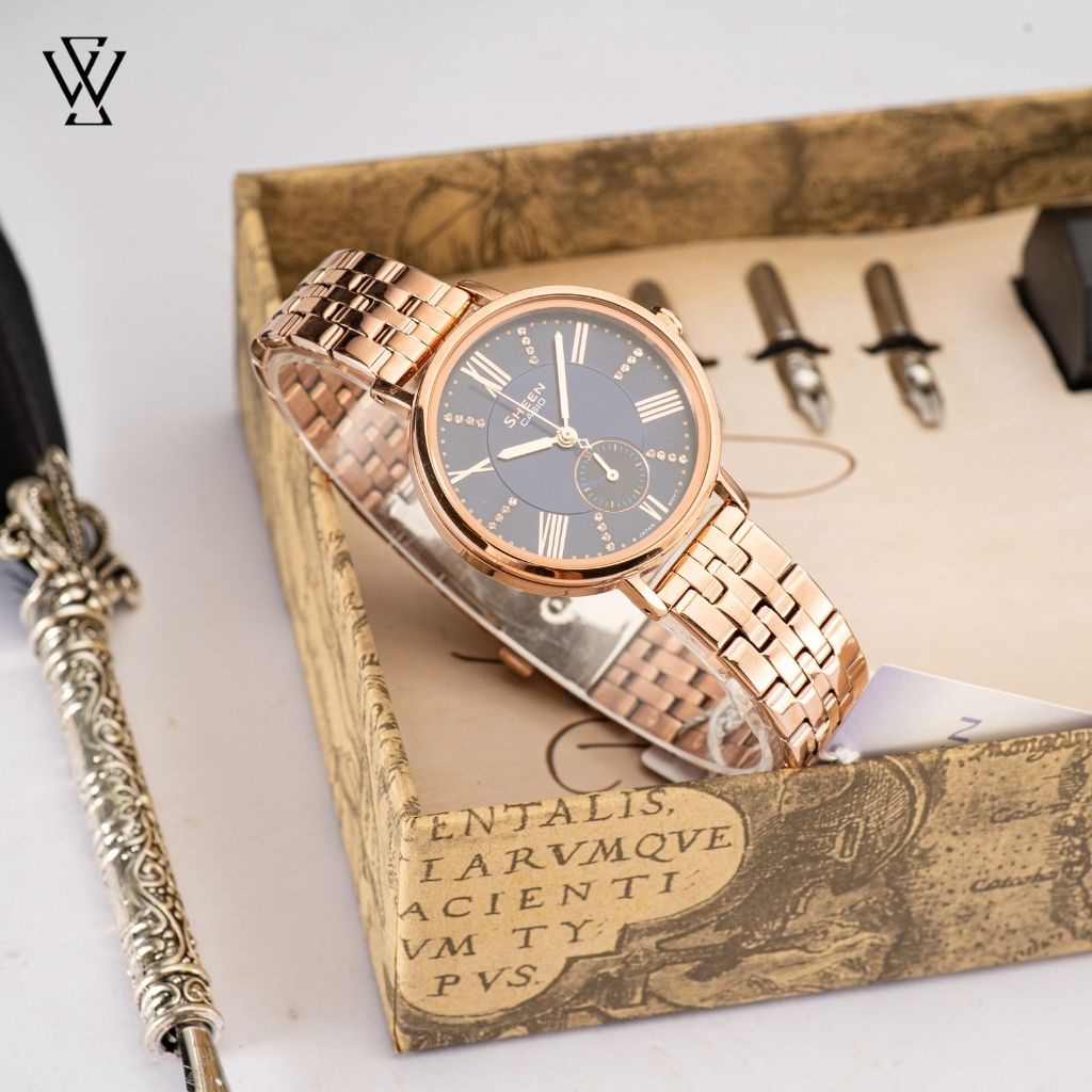 Đồng Hồ Quartz Nữ Casio Sheen WATCHSTORE SHE-3066PG-2AVDF Thiết Kế Mặt Kính Khoáng 34mm, Dây Kim Loại, Vỏ Thép Không Gỉ