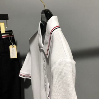Áo polo trắng Thom Browne nam