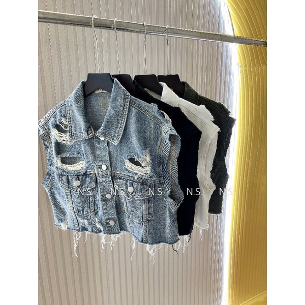 Áo gile bò rách tả tơi