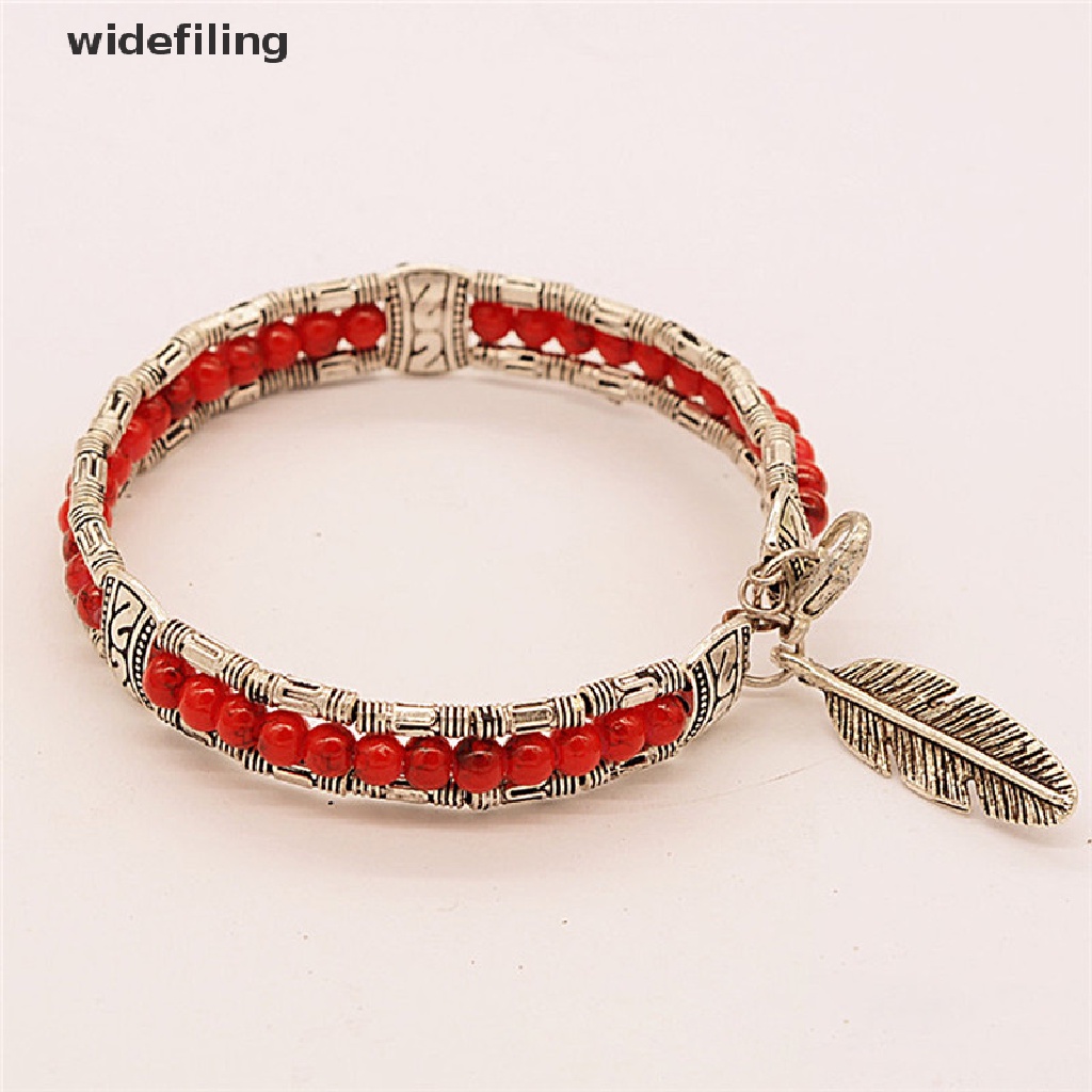Vòng tay bạc xỏ hạt mặt dây hình lông vũ phong cách Bohemian thời trang cho nữ