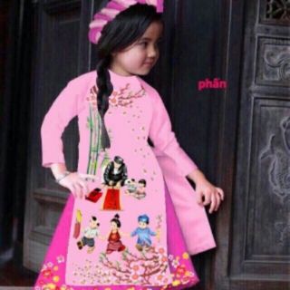 Áo dài bé gái sắc xuân rực rỡ.
