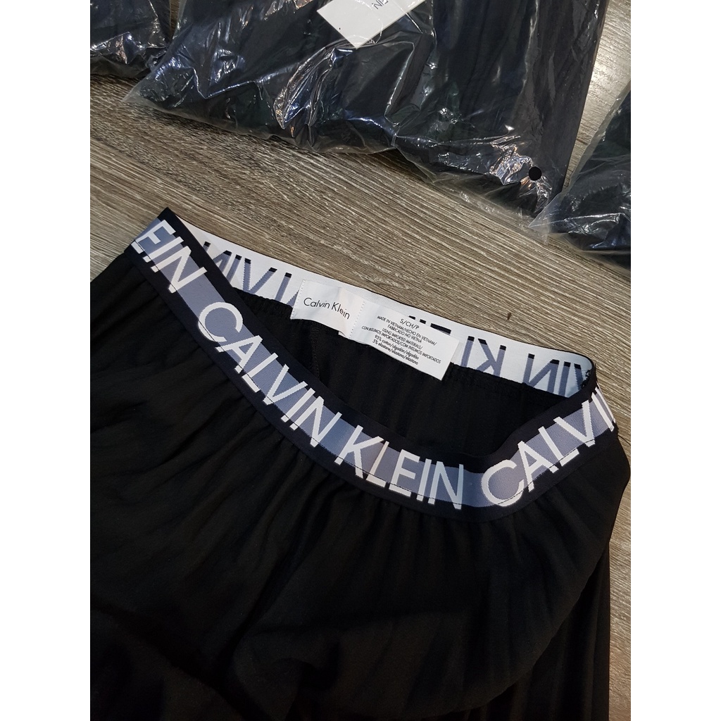 Chân Váy Ck Suông Dài Xếp Ly Hàng Cao Cấp Viền Eo Tên Thương Hiệu