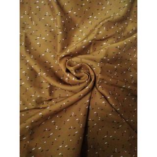 vải lụa màu đồng chấm bi