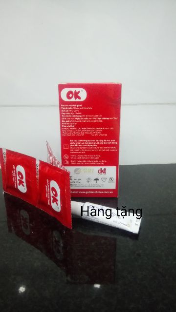 (Com bo chống xuất tinh sớm ) Bao cao su Ok đỏ hộp 12 cái. Tặng 1 tinh chất chống xuất tinh sớm.