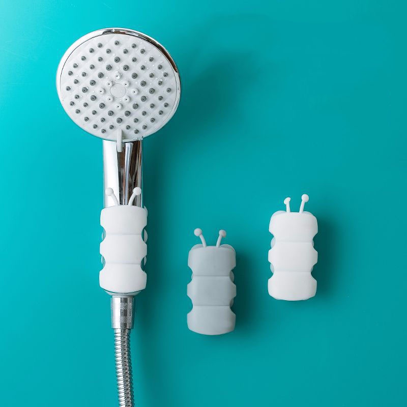 Giá giữ vòi hoa sen kiểu cốc hút cố định không cần khoan lỗ thiết kế sâu bướm đáng yêu dành cho phòng tắm