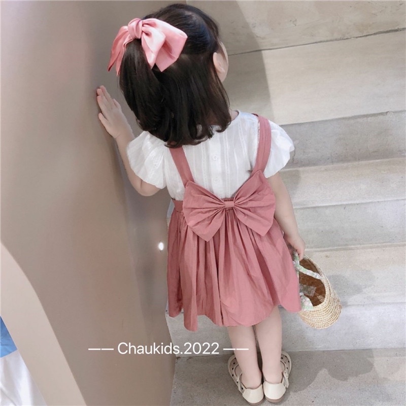 Váy yếm hồng kèm nơ xinh xắn cho bé gái