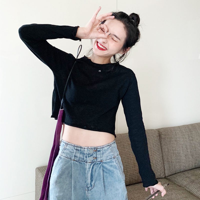 Áo sweater nữ tay dài dáng rộng màu trơn | BigBuy360 - bigbuy360.vn