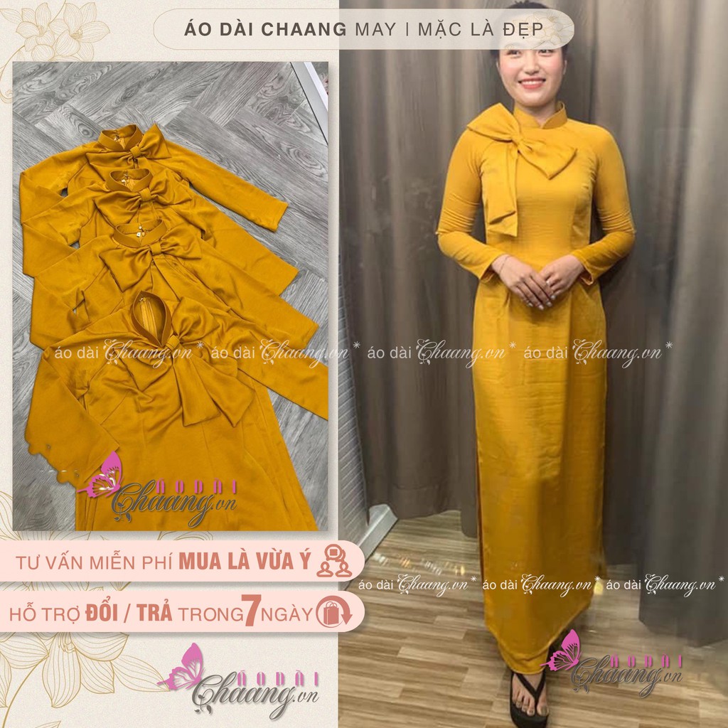 Áo dài lụa tuyết đồng đậm có nơ trên ngực dáng áo truyền thống